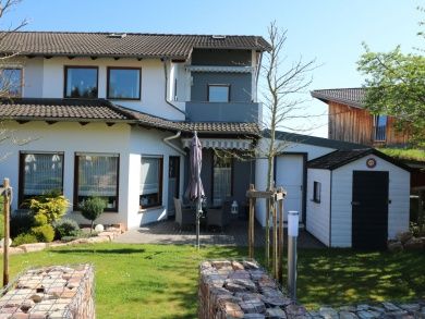 Ferienwohnung Dreiburgenblick und Ferienwohnung Gardenlounge